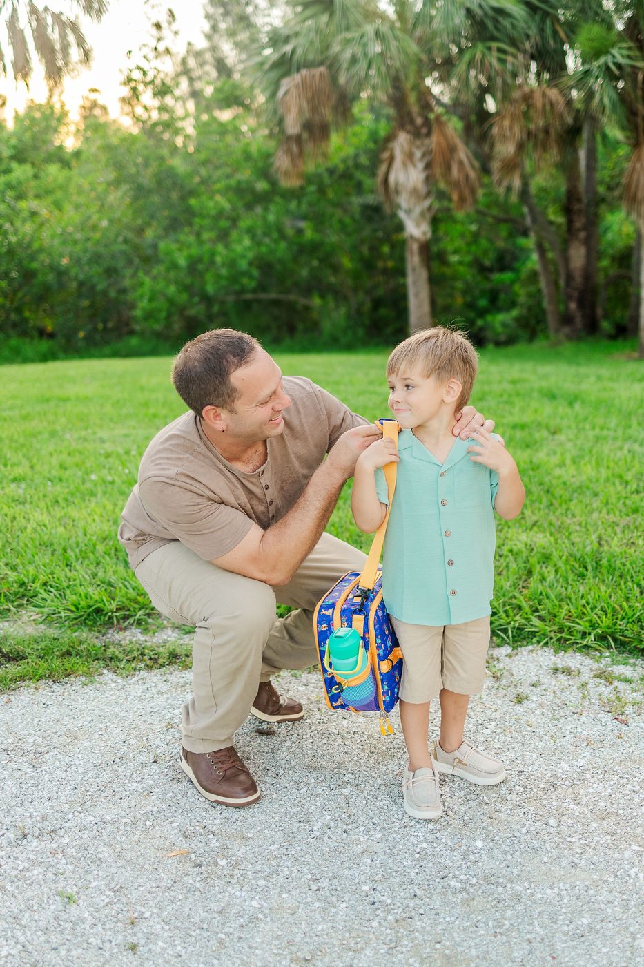 Dad and child with PACKROO